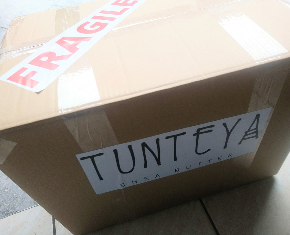 
                  
                    labeled box of tunteya shea butter 
                  
                